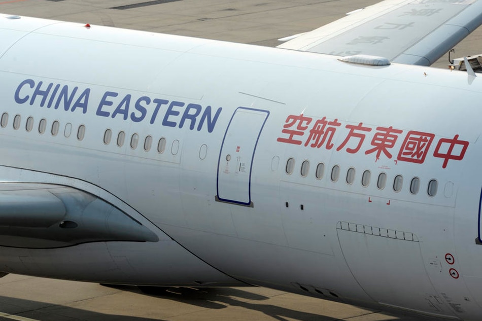 The signage on a China Eastern Airlines Airbus A330-243 passenger plane at Frankfurt airport, Frankfurt, Germany, February 8, 2018 (reissued March 21 2022). A China Eastern Airlines Boeing 737-800 with 132 people on board crashed in southern China on a flight from Kunming to Guangzhou on March 21, 2022. Mauritz Antin, EPA-EFE/File