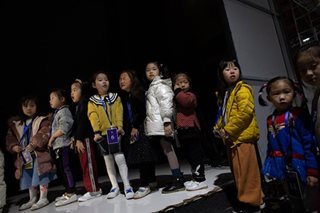 Chinese officials punished after family violates one-child policy with 15 kids
