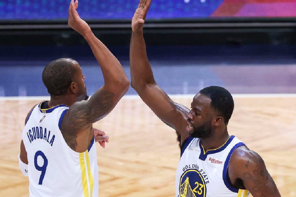 Warriors teammates Andre Iguodala and Draymond Green (right) celebrate in their game against the Nets November 16, 2021. Justin Lane, Shutterstock Out/EPA-EFE/file