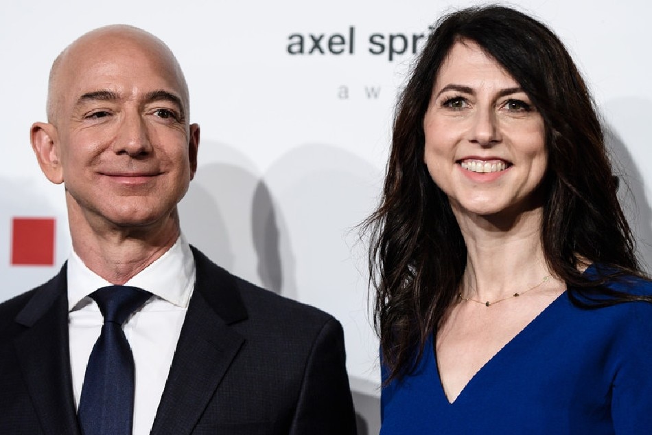 MacKenzie Scott (R), ex-wife of Amazon CEO Jeff Bezos (L) attend the Axel Springer Award 2018, in Berlin, Germany, 24 April 2018 (reissued 29 May 2019). According to media reports, MacKenzie Bezos plans to give at least half of her fortune to charity. Clemens Bilan, EPA-EFE