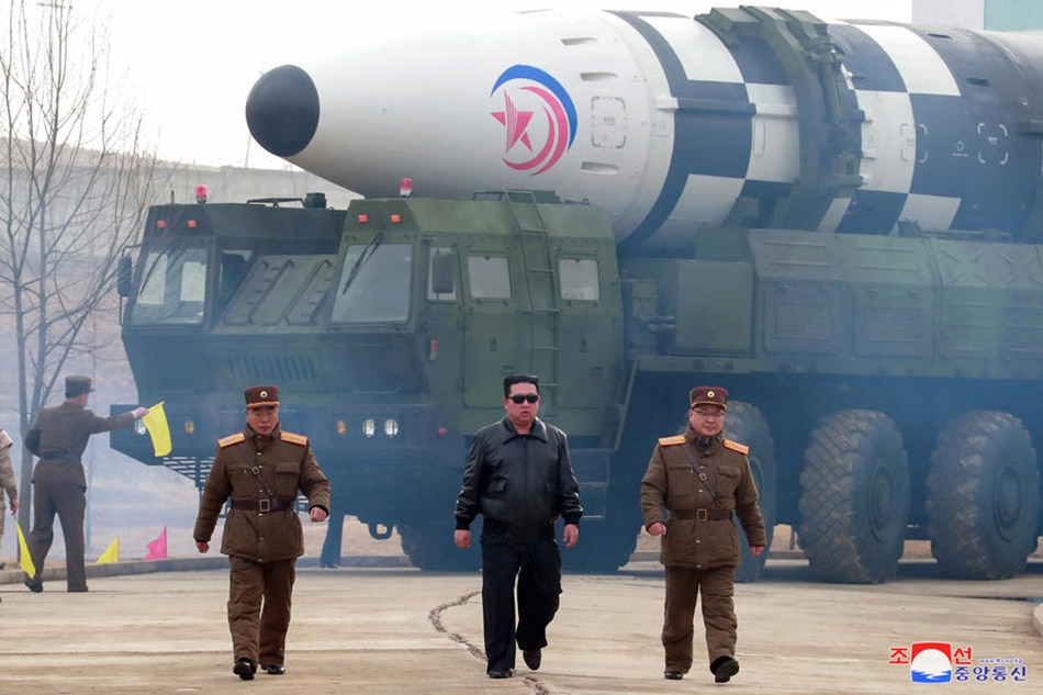 A photo released by the official North Korean Central News Agency (KCNA) shows Kim Jong Un (C), president of the State Affairs of the Democratic People's Republic of Korea (DPRK), and supreme commander of the armed forces of the DPRK, during the test-launch of a new type of inter-continental ballistic missile Hwasongpho-17 of the DPRK strategic forces that was conducted on March 24, 2022 (issued 25 March 2022). EPA-EFE/KCNA/file