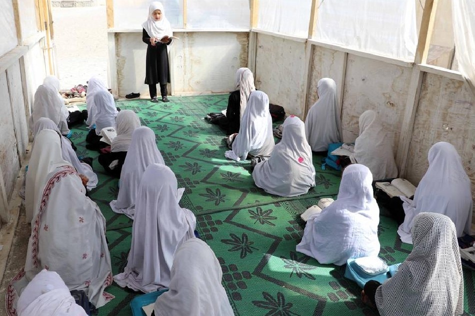 Afghan girls of up to primary grades attend a class at their school in Kandahar, Afghanistan, March 23, 2022. EPA-EFE/Stringer/file