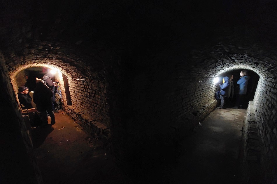 Local people share a basement of a historical building which is being used as a bomb shelter during an air raid warning in the Western Ukrainian city of Lviv, 26 March 2022, amid the Russian invasion. Mykola Tys, EPA-EFE