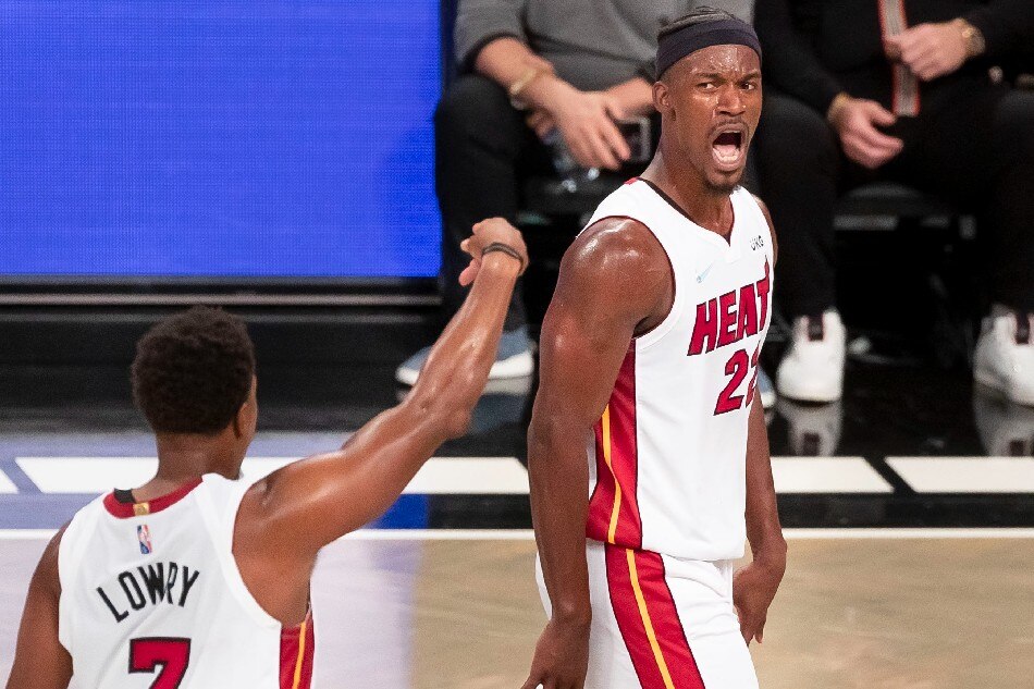 Miami Heat forward Jimmy Butler (R) and guard Kyle Lowry (L) react to a late three pointer by teammate P.J. Tucker during the fourth quarter of the NBA basketball game between the Miami Heat and the Brooklyn Nets at the Barclays Center in Brooklyn, New York, USA, 27 October 2021. File photo. Justin Lane, EPA-EFE