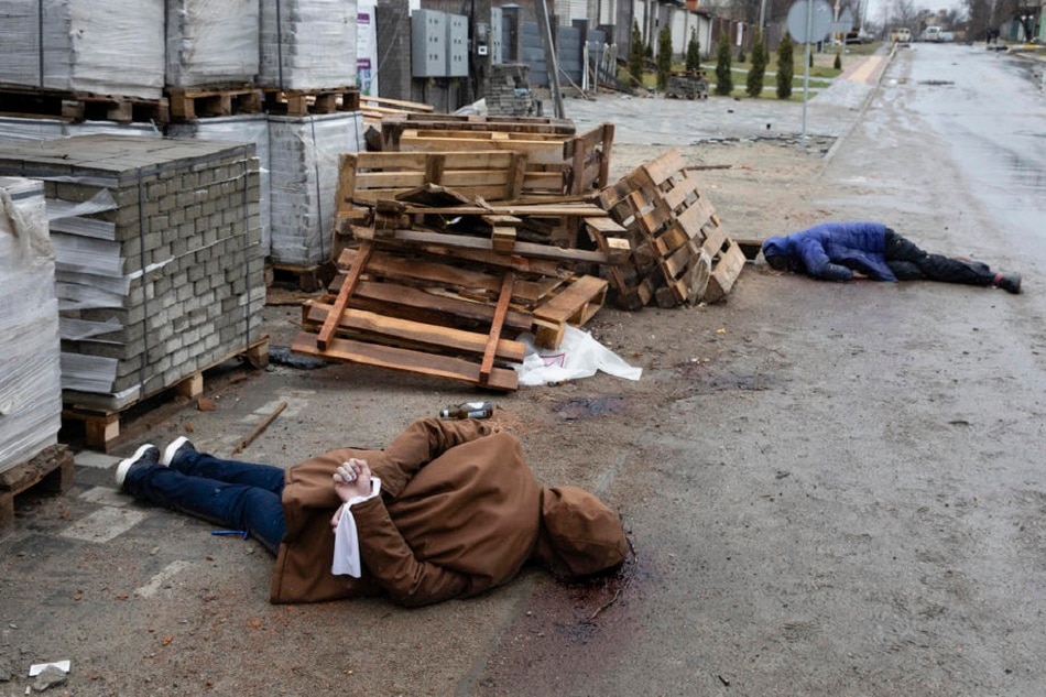 Bodies of Ukrainian civilians killed in the Russian invasion lie on a street in the small city of Bucha of Kyiv (Kiev) area, Ukraine, April 3, 2022. Some cities and villages had recently been recaptured by the Ukrainian army from Russian forces. Mikhail Palinchak, EPA-EFE 