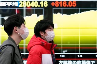 Tokyo trade seesaws on Ukraine crisis, China lockdown