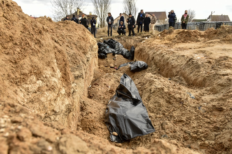  Bodies of civilians in plastic bags lay in a mass grave in Bucha city, which was the recaptured by the Ukrainian army, Kyiv area, Ukraine, April 4, 2022. More than 410 bodies of killed civilians were carried from the recaptured territory in Kyiv's area for exhumation and expert examination. The UN Human Rights Council has decided to launch an investigation into the violations committed after Russia's full-scale invasion of Ukraine as Ukrainian Parliament reported. Oleg Petrasyuk, EPA-EFE
