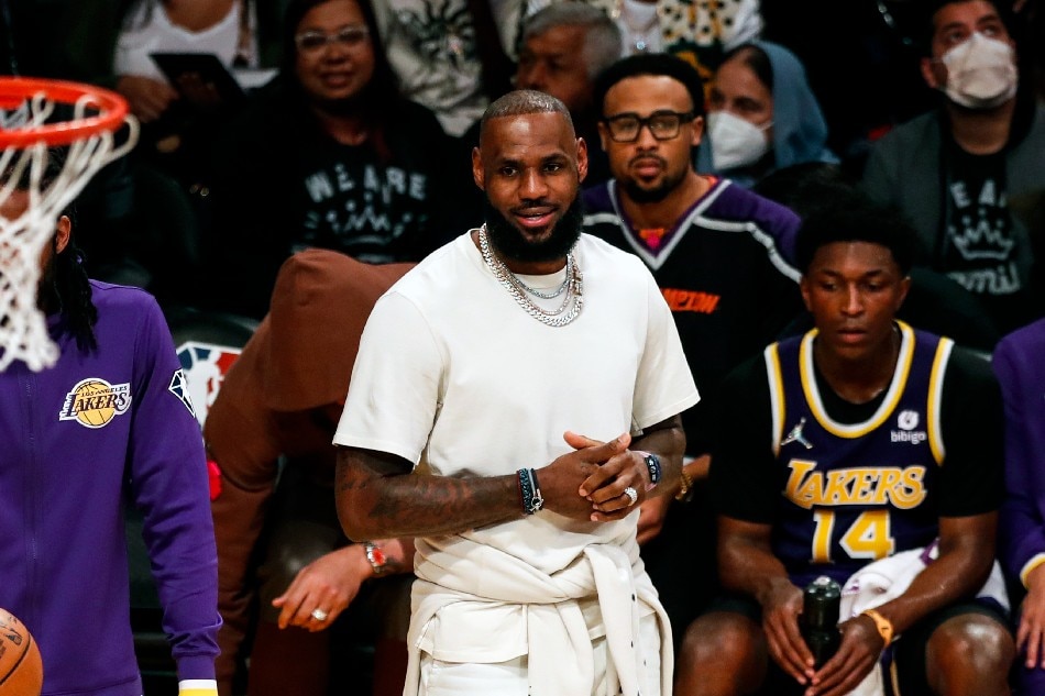Los Angeles Lakers forward LeBron James attends the third quarter of the NBA basketball game between the Los Angeles Lakers and the Philadelphia 76ers at the Crypto.com Arena in Los Angeles, California, USA, 23 March 2022. Etienne Laurent, EPA-EFE