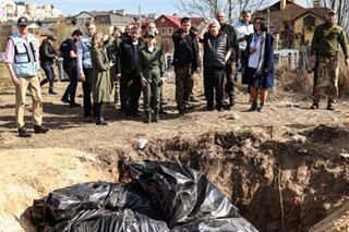 UN inspects mass grave in Bucha, Ukraine