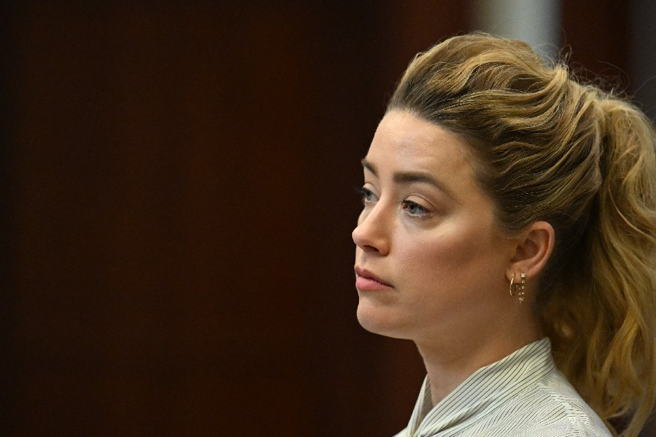 US actress Amber Heard attends trial at the Fairfax County Circuit Courthouse in Fairfax, Virginia, USA, 19 April 2022. Johnny Depp's 50 million US dollars defamation lawsuit against Amber Heard that started on 10 April is expected to last five or six weeks. EPA-EFE/JIM WATSON / POOL