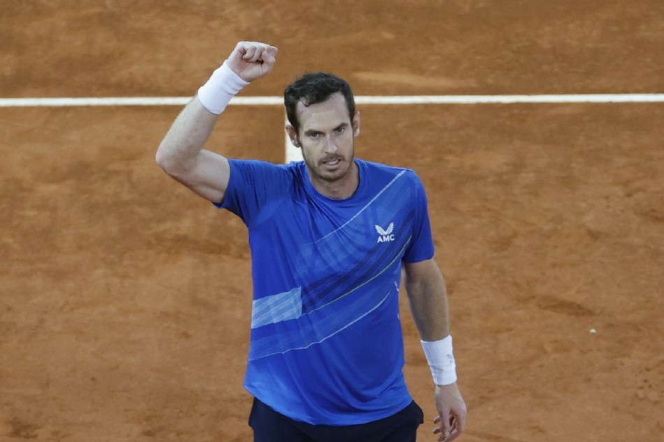 Andy Murray of Britain celebrates after winning his men's singles round of 64 match against Dominic Thiem of Austria at the Mutua Madrid Open's tennis tournament at the Caja Magica in Madrid, Spain, 02 May 2022. Juanjo Martin, EPA-EFE
