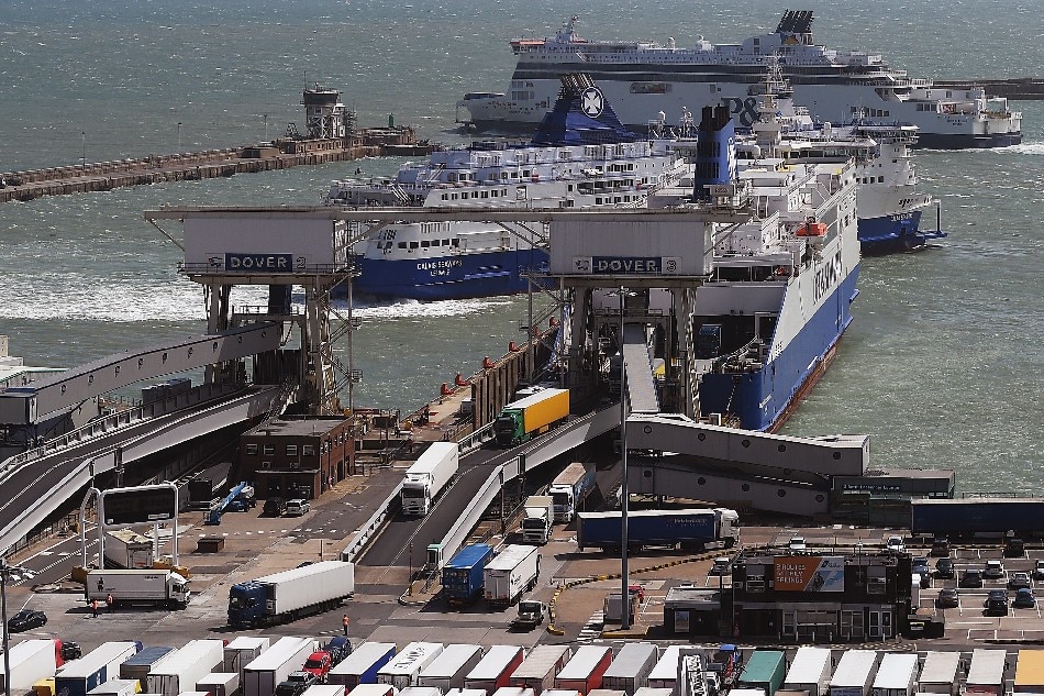 Lorries disembark from ferries in Dover, south east of London, Britain, 04 August 2015 (reissued 29 December 2018). The British government has chartered ferries to deal with the possibility of an unregulated exit from the European Union. EPA-EFE/ANDY RAIN