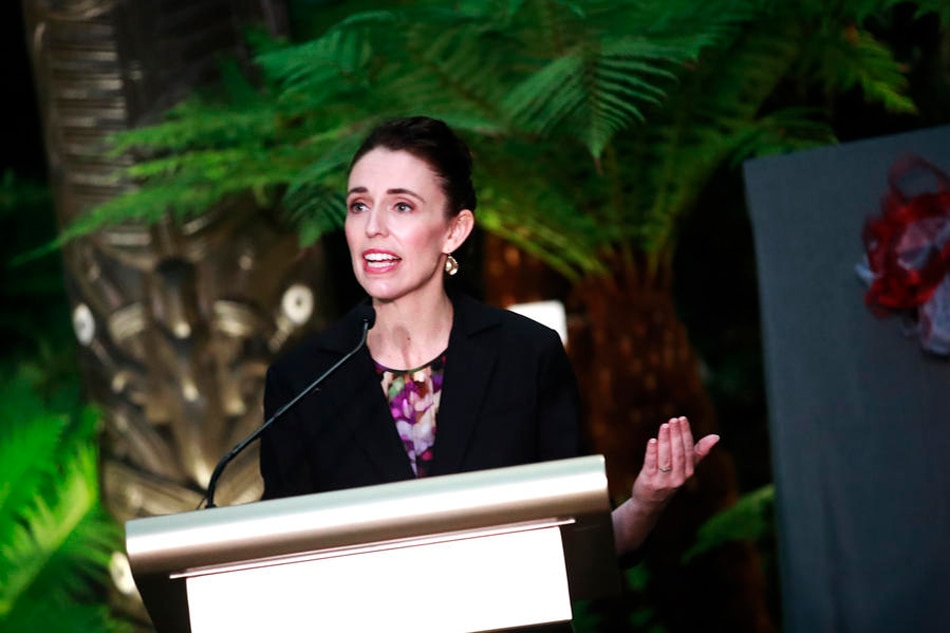 New Zealand’s Prime Minister Jacinda Ardern delivers her speech during an unveiling ceremony for a Maori kuwaha carving sculpture, named Tane Te Waiora, at the Cloud Forest, Gardens by the Bay in Singapore, April 19, 2022. How Hwee Young, EPA-EFE/File 