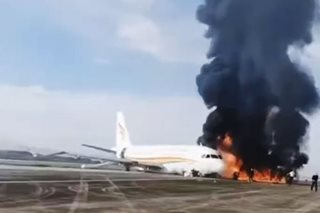 Chinese plane catches fire at airport