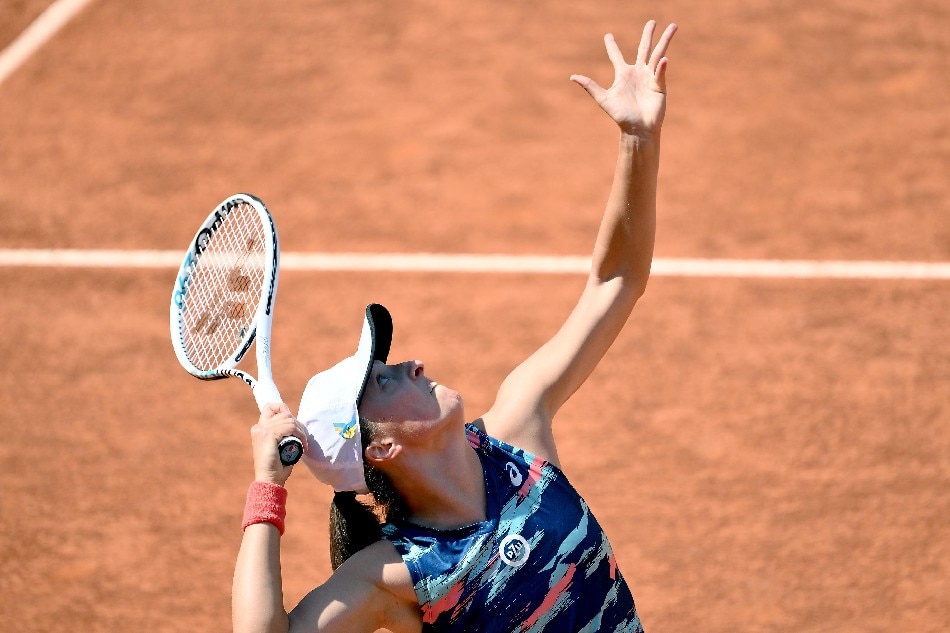 Iga Swiatek of Poland in action during her women's singles second round match against Elena-Gabriela Ruse of Romania at the Italian Open tennis tournament in Rome, Italy, 11 May 2022. Ettore Ferrari, EPA-EFE