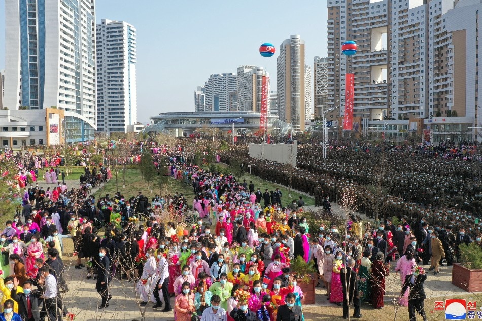 A photo released by the official North Korean Central News Agency shows a dedication ceremony for the Songhwa District in eastern Pyongyang, North Korea, April 11, 2022 (issued 12 April 2022), that contains 50,000 new apartments, resolving the capital city's housing shortage. North Korean leader Kim Jong-un attended its dedication ceremony on 11 April 2022. KCNA, EPA-EFE