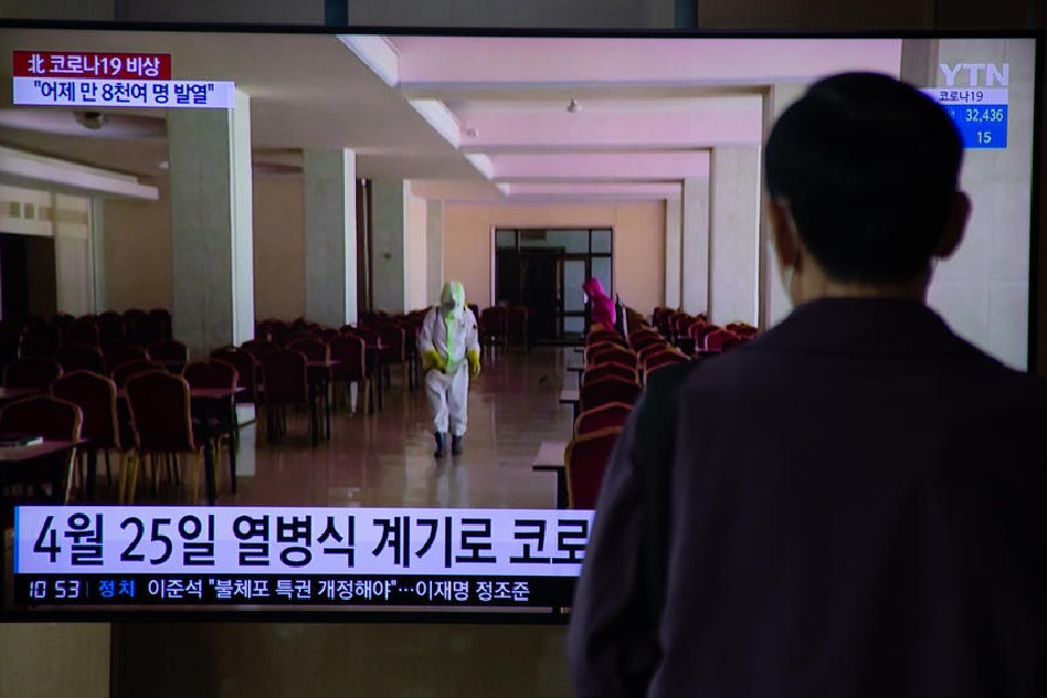 A man watches a news report on a COVID-19 outbreak in North Korea, at a station in Seoul, South Korea, May 13, 2022. The North Korean state media agency (KCNA) announced an outbreak of COVID-19 in the country. A nation-wide lockdown was instituted in response and on May 13, the first COVID-19 related deaths were reported. Jeon Heon-Kyun, EPA-EFE 