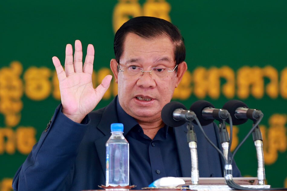 Cambodian Prime Minister Hun Sen speaks during the inauguration ceremony for a bridge in the outskirt of Phnom Penh, Cambodia, March 31, 2022. Kith Serey, EPA-EFE