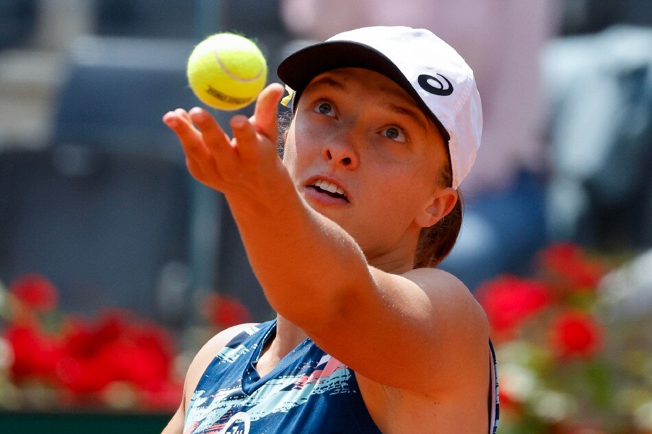 Iga Swiatek of Poland in action during her women's singles final match against Ons Jabeur of Tunisia at the Italian Open tennis tournament in Rome, Italy, 15 May 2022. Fabio Frustaci, EPA-EFE.