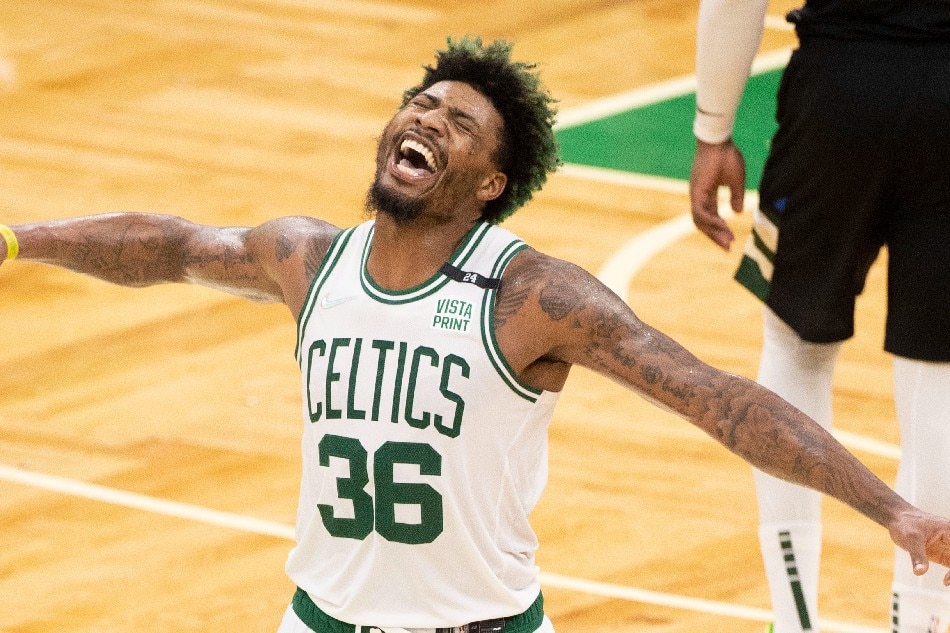 Boston Celtics guard Marcus Smart celebrates in the final moments of the game during the second half Game 7 of their Eastern Conference semifinals series against the Milwaukee Bucks at the TD Garden in Boston, Massachusetts, USA, 15 May 2022. CJ Gunther, EPA-EFE
