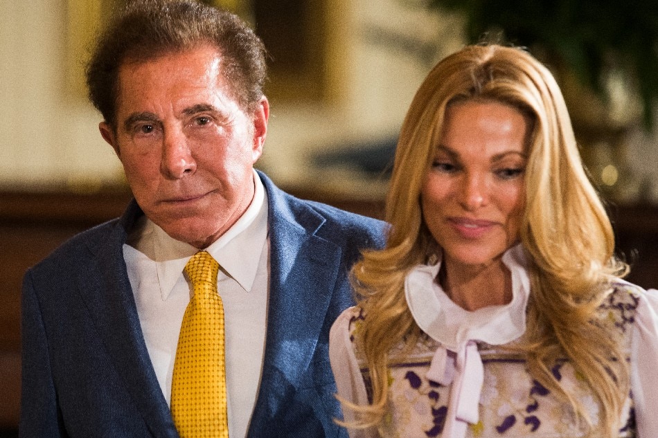 Real estate businessman Steve Wynn (L) and his wife Andrea Hissom (R) prepare to listen to US President Donald Trump speak about the opening of a Foxconn manufacturing plant in Wisconsin in the East Room of the White House in Washington, DC, USA, 26 July 2017. EPA/JIM LO SCALZO