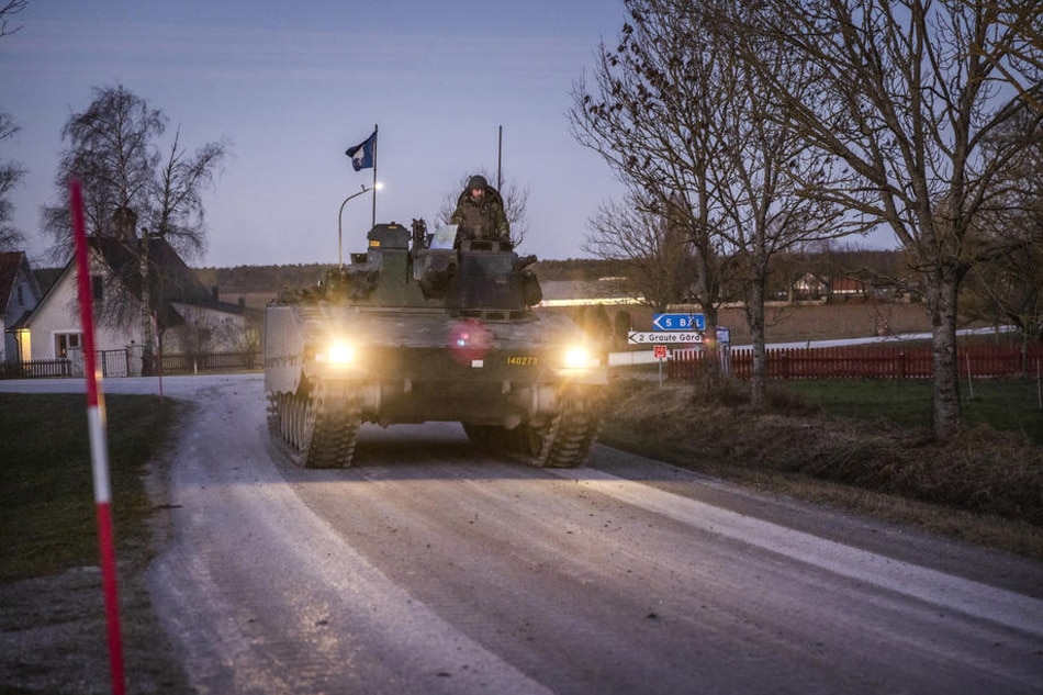 Swedish soldiers of the Gotland's Regiment patrol in armored vehicles on the roads near Visby in nothern Gotland, Sweden, Jan. 16, 2022. Sweden has increased their military presence in the Gotland region over an alleged increased 'Russian activity' in the region. Tensions between NATO and Russia have increased, both sides accusing the other of a potential escalation. Karl Melander, EPA-EFE 