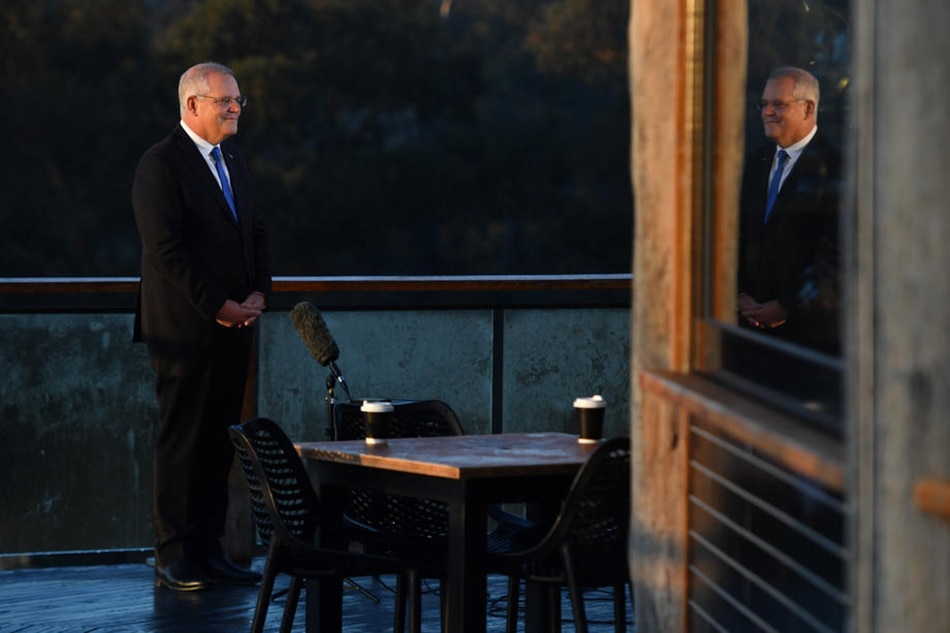  Australian Prime Minister Scott Morrison conducts morning television interviews on Federal Election day, in the seat of McEwen in Melbourne, Australia, on May 21, 2022. Mick Tsikas, EPA-EFE