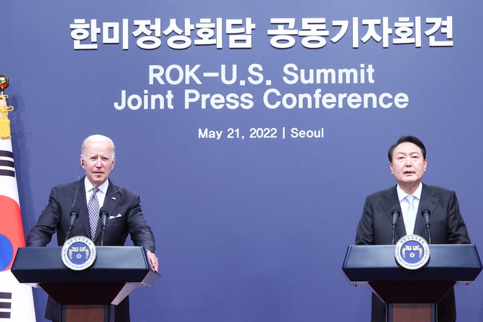 US President Joe Biden (L) and South Korean President Yoon Suk-yeol (R) address a joint press conference following their meeting in Seoul, South Korea, on May 21, 2022. EPA-EFE/Yonhap