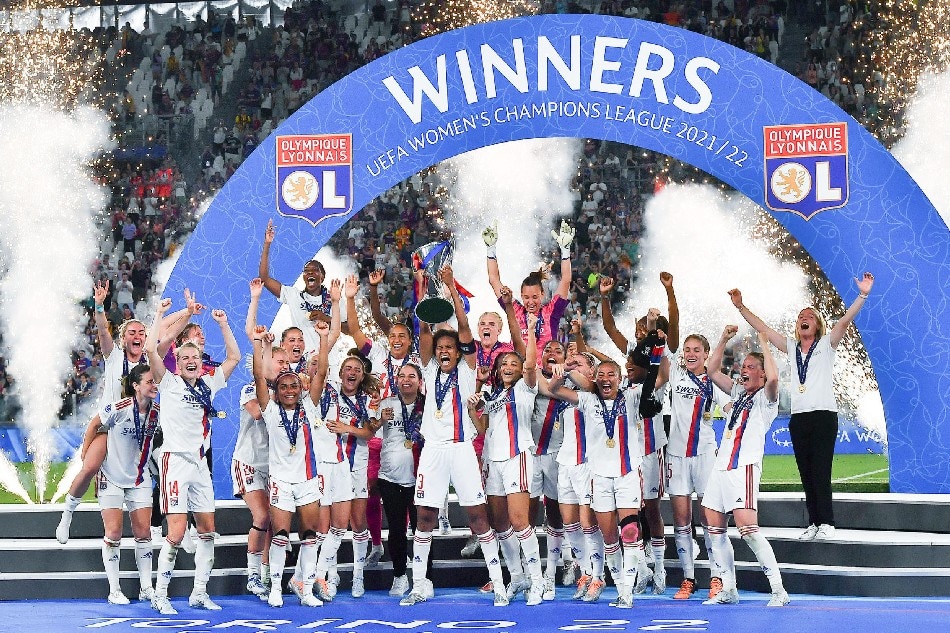 Lyon players celebrate with the trophy after winning the Women's UEFA Champions League final soccer match FC Barcelona vs Olympique Lyon at the Allianz Stadium in Turin, Italy, 21 May 2022. Alessandro di Marco, EPA-EFE.