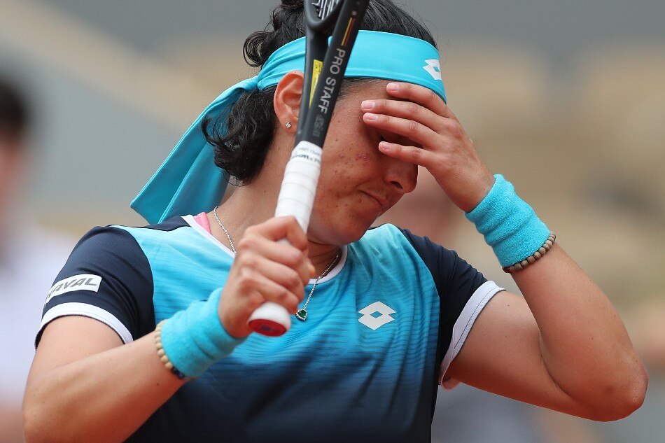 Ons Jabeur of Tunisia plays Magda Linette of Poland in their women’s first round match during the French Open tennis tournament at Roland ​Garros in Paris, France, 22 May 2022. Martin Divíšek, EPA-EFE
