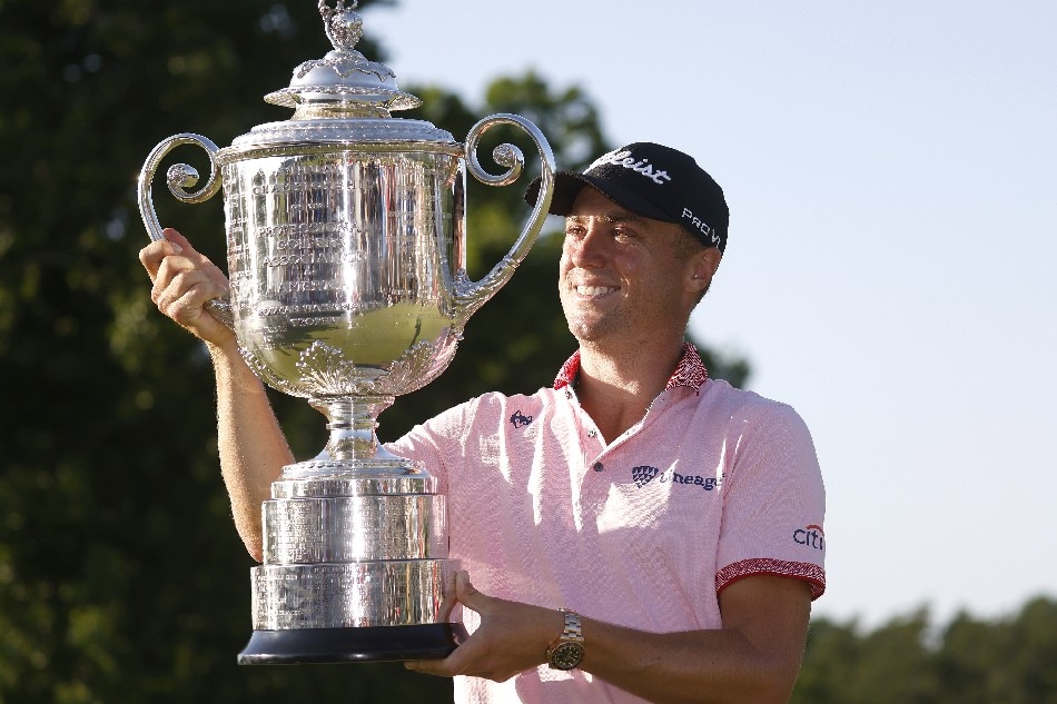 Justin Thomas of the USA holds up the Wanamaker Tropy after winning the playoff round against Will Zalatoris of the USA during the final round of the 2022 PGA Championship golf tournament at the Southern Hills Country Club in Tulsa, Oklahoma, USA, 22 May 2022. Tannen Maury, EPA-EFE