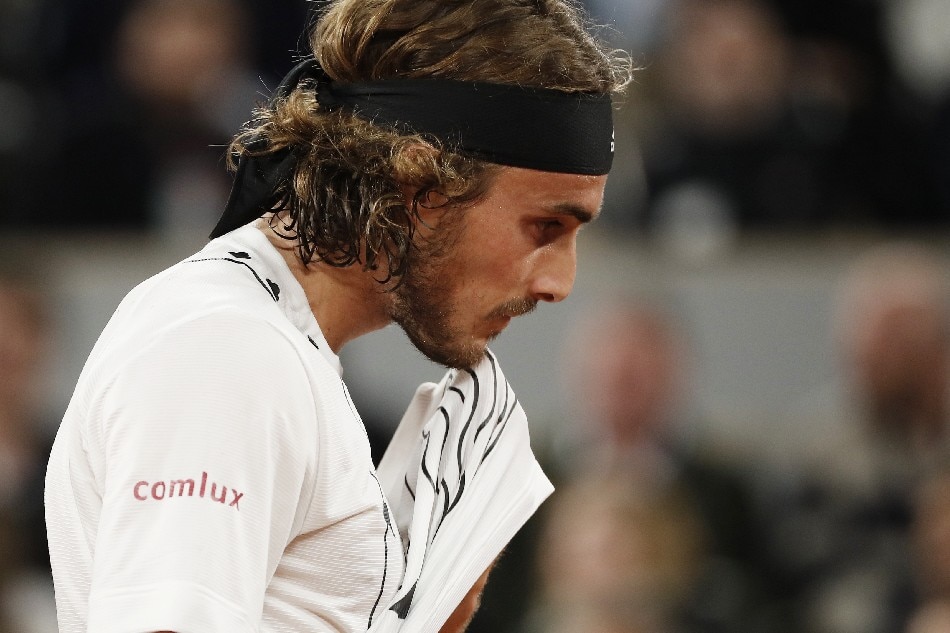 Stefanos Tsitsipas of Greece looks on in his men's first round match against Lorenzo Musetti of Italy during the French Open tennis tournament at Roland ​Garros in Paris, France, 24 May 2022. Christophe Petit Tesson, EPA-EFE