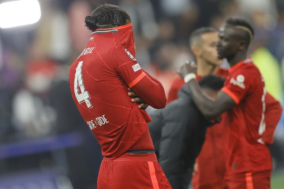 Virgil Van Dijk (L) of Liverpool reacts after the UEFA Champions League final between Liverpool FC and Real Madrid at Stade de France in Saint-Denis, near Paris, France, 28 May 2022. Ronald Wittek, EPA-EFE