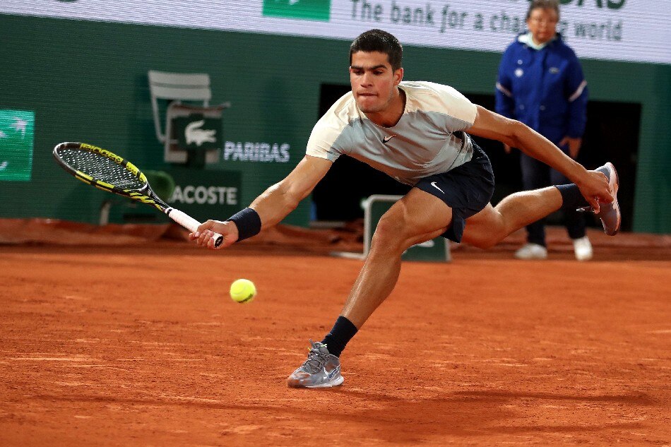 Carlos Alcaraz of Spain in action against Karen Khachanov of Russia during their men's fourth round match of the French Open Grand Slam tennis tournament at Roland Garros in Paris, France, 29 May 2022. Martin Divíšek, EPA-EFE