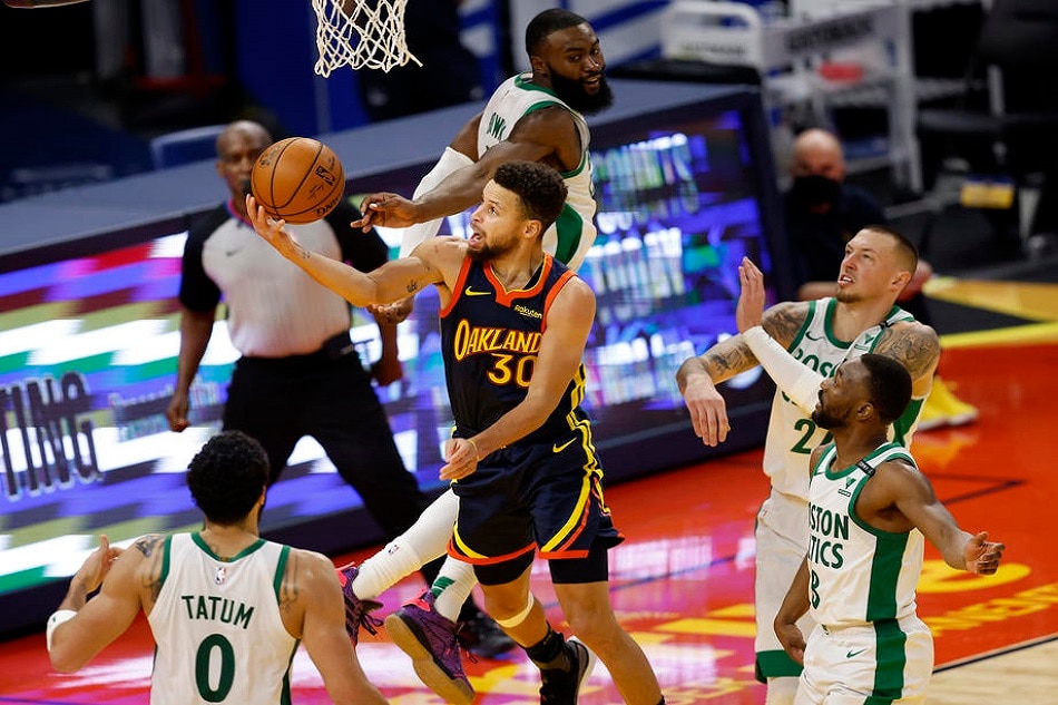 Warriors guard Stephen Curry in action against the Celtics on February 2, 2021. John G Mabanglo, Shutterstock Out/EPA-EFE/file