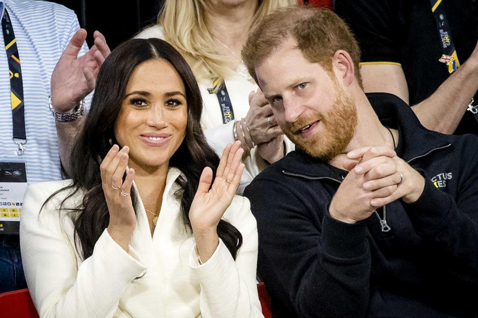 Prince Harry and his wife, Meghan, attend the sitting volleyball section of the fifth edition of the Invictus Games in The Hague, The Netherlands, April 17, 2022. Sem Van Der Wal, EPA-EFE/file