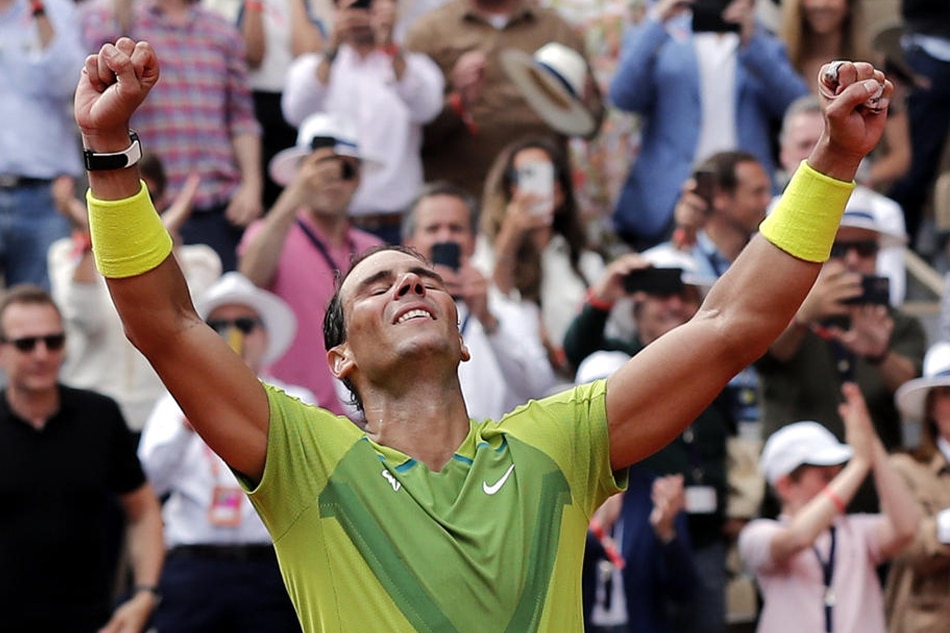 Rafael Nadal of Spain celebrates after winning against Casper Ruud of Norway in their Men’s Singles final match during the French Open tennis tournament at Roland ​Garros in Paris, France, 05 June 2022. Christophe Petit Tesson, EPA-EFE 