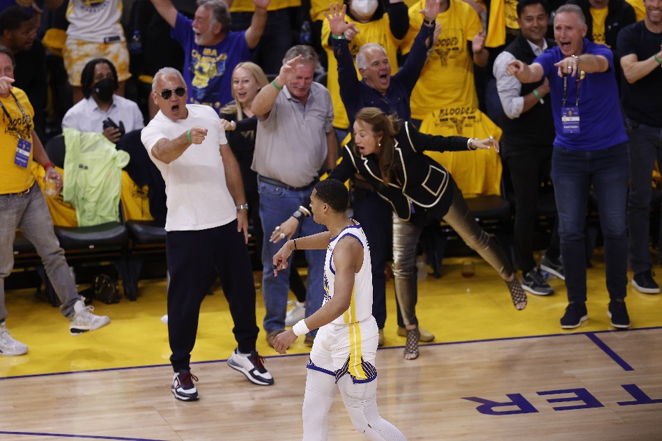 Golden State Warriors fans celebrate after Jordan Poole hit a basket during the third quarter of Game 2 of the NBA Finals series between the Golden State Warriors and the Boston Celtics at the Chase Center in San Francisco, California, USA, 05 June 2022. John Mabanglo, EPA-EFE.