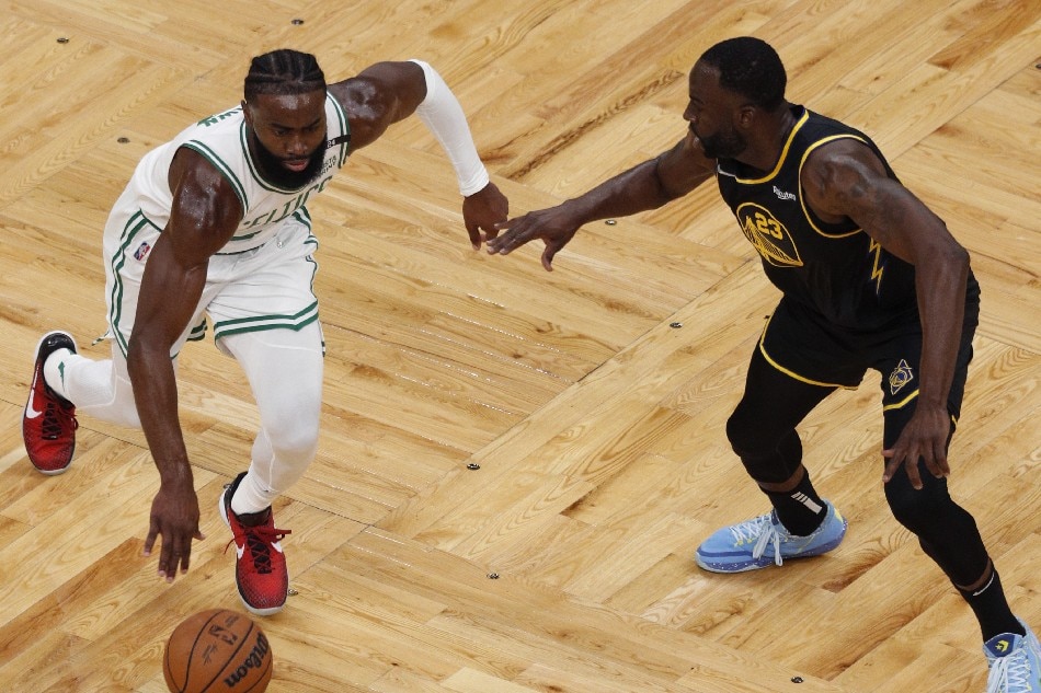  Boston Celtics guard Jaylen Brown (L), drives by Golden State Warriors forward Draymond Green (R), during the first half of Game 3 of the NBA Finals at TD Garden, in Boston, Massachusetts, USA, 08 June 2022. CJ Gunther, EPA-EFE.