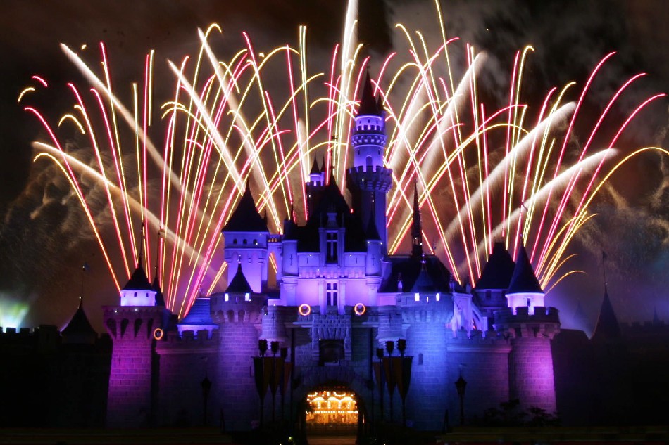 Fireworks explode over the Sleeping Beauty Castle at Hong Kong Disneyland as it officially opened Monday, 12 September 2005. EPA/STR
