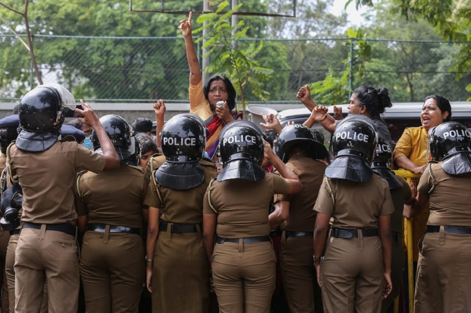 Supporters of Sri Lanka's main opposition party Samagi Jana Balawegaya shout slogans during a protest outside the prime minister's private residence in Colombo, Sri Lanka, June 22, 2022. The group, mostly women, staged a protest accusing the country’s Prime Minister Ranil Wickremesinghe of failing to address the ongoing economic crisis issue, and calling for his resignation. Chamila Karunarathne, EPA-EFE