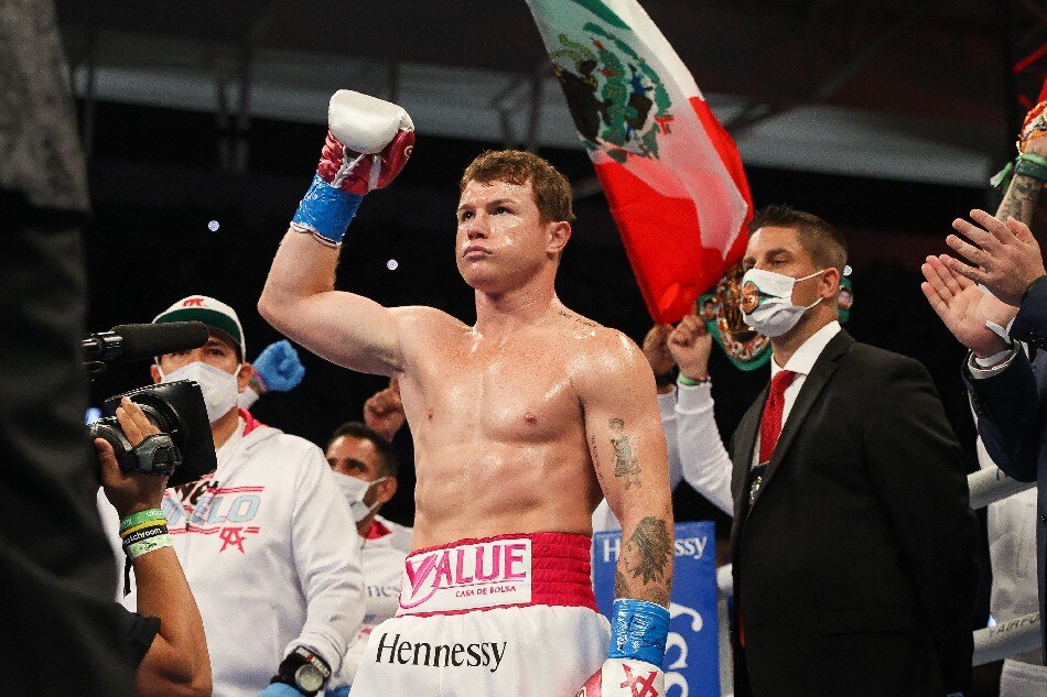 This handout photo released by Matchroom shows Saul Alvarez after winning his WBA, WBC and Ring Magazine super middleweight championship bout against Avni Yildirim at the Hard Rock Stadium in Miami Gardens, Florida, February 27, 2021. File photo. Ed Mulholland, Matchroom Boxing/AFP