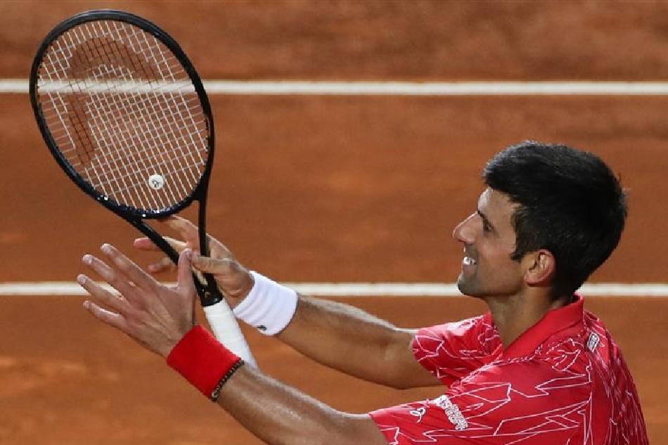 Serbia's Novak Djokovic celebrates after winning the final match of the Men's Italian Open against Argentina's Diego Schwartzman at Foro Italico on September 21, 2020 in Rome, Italy. File photo. Clive Brunskill, AFP.