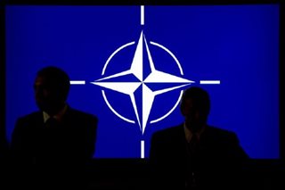 Newly enlarged NATO talks China and Ukraine	