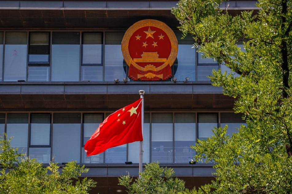 China's flag flutters outside a building in Beijing, June 2, 2022. Mark R. Cristino, EPA-EFE