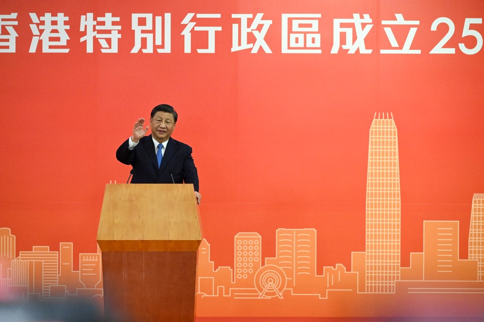 China's President Xi Jinping gestures as he speaks upon his arrival via high-speed rail in Hong Kong on June 30, 2022, for celebrations marking the 25th anniversary of the city's handover from Britain to China. Selim Ctayti, Pool/AFP