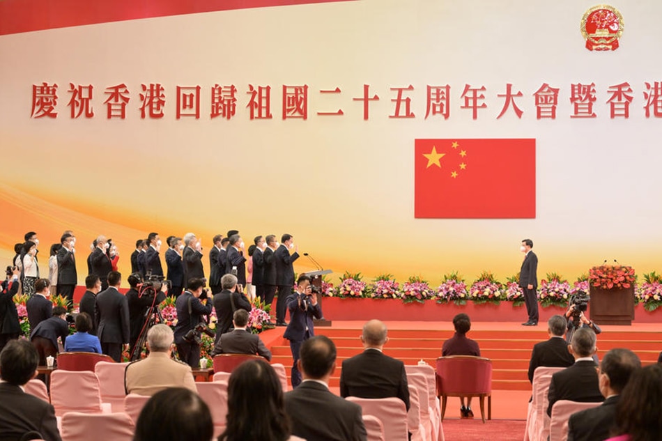 A handout photo shows Hong Kong’s new chief executive John Lee (R), swearing in members of the Executive Council at an inaugural ceremony of the Sixth-term Government of the Hong Kong Special Administrative Region on July 1, 2022. EPA-EFE/Information Services Department Handout