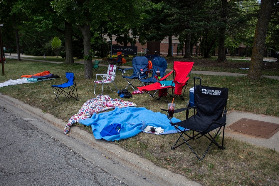 Chairs and blankets are left abandoned after a shooting at a Fourth of July parade on July 4, 2022 in Highland Park, Illinois. Reports indicate at least five people were killed and 19 injured in the mass shooting. Jim Vondruska, Getty Images/AFP 