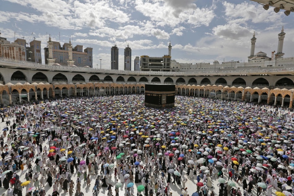 Muslim pilgrims circle around the Kaaba at the Masjidil Haram, Islam's holiest site during the Hajj pilgrimage in Mecca, Saudi Arabia, August 13, 2019. EPA-EFE stringer