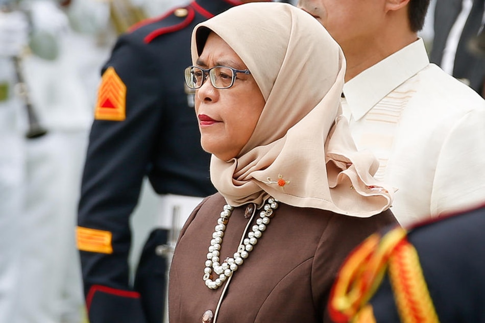 Singapore President Halimah Yacob attends a wreath-laying ceremony in Manila, Philippines, September 9, 2019. Mark R. Cristino, EPA-EFE/File